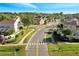 Neighborhood view showing street and homes at 2430 Berkshire Ct, Kissimmee, FL 34746