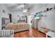 Bright bedroom with wood floors and plenty of space for a bed and other furniture at 2430 Berkshire Ct, Kissimmee, FL 34746