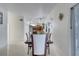 Spacious dining room with a view into the kitchen at 2430 Berkshire Ct, Kissimmee, FL 34746