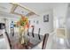 Bright dining room with a glass-top table and seating for six at 2430 Berkshire Ct, Kissimmee, FL 34746