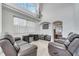 Living room with two comfortable sofas and a large window at 2430 Berkshire Ct, Kissimmee, FL 34746
