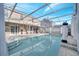 Sparkling pool with a large screened enclosure, providing shade and privacy at 2430 Berkshire Ct, Kissimmee, FL 34746