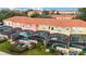 Aerial view of townhomes with private pools and screened enclosures at 3145 Yellow Lantana Ln, Kissimmee, FL 34747