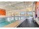 Resort-style indoor pool with comfortable seating at 336 Alicante Ct, Davenport, FL 33837