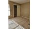 Bedroom with tile flooring, a large window, and sliding closet doors at 42 Silver Swan Ct, Kissimmee, FL 34743