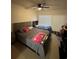 A comfortable bedroom featuring a ceiling fan and two beds at 4320 S Kirkman Rd # 1513, Orlando, FL 32811
