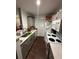 Modern kitchen featuring white countertops, gray cabinets, and stainless steel appliances at 4320 S Kirkman Rd # 1513, Orlando, FL 32811