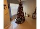 Christmas tree in corner of living room at 4320 S Kirkman Rd # 1513, Orlando, FL 32811