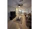 Open living room with view of kitchen and dining area at 4320 S Kirkman Rd # 1513, Orlando, FL 32811
