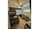 ' bedroom with bunk beds, ceiling fan, work desk, and ample natural light at 4368 S Kirkman Rd # 201, Orlando, FL 32811