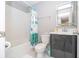 Clean bathroom with shower/tub combo and modern vanity at 4414 Le Reve Ct, Kissimmee, FL 34746