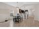 Dining area adjacent to the kitchen with modern light fixture and tile floor at 4768 Marcos Circle, Kissimmee, FL 34758