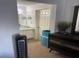 View from the bedroom into the attached bathroom with a vanity and a closed door at 508 Orange Dr # 20, Altamonte Springs, FL 32701