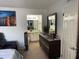 Bedroom featuring a vanity area with a view of the attached bathroom at 508 Orange Dr # 20, Altamonte Springs, FL 32701