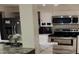 Kitchen with stainless steel appliances, granite countertops, and white cabinetry at 508 Orange Dr # 20, Altamonte Springs, FL 32701