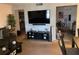Living room with a large TV, comfortable seating, and various decor at 508 Orange Dr # 20, Altamonte Springs, FL 32701