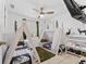 ' bedroom with two teepee beds, forest-themed decor, and a changing table at 622 Parakeet Ct, Kissimmee, FL 34759