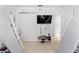 bedroom with two teepee beds, nature-inspired wall decals, and a TV at 622 Parakeet Ct, Kissimmee, FL 34759