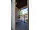 Balcony with a comfy chair, offering views of the surrounding area at 733 Calabria Ave, Davenport, FL 33897