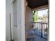 Relaxing balcony with seating and overlooking a serene neighborhood at 733 Calabria Ave, Davenport, FL 33897