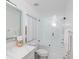 Sleek white bathroom with modern fixtures and glass shower enclosure at 733 Calabria Ave, Davenport, FL 33897
