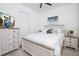 Cozy bedroom with white wood furniture, a TV, and subtle decor at 733 Calabria Ave, Davenport, FL 33897