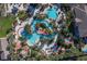 Inviting community pool with a water slide and ample space for lounging at 733 Calabria Ave, Davenport, FL 33897