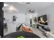 View of living room and dining area with white kitchen in background at 733 Calabria Ave, Davenport, FL 33897