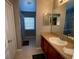 Bright bathroom with a vanity, toilet and shower at 842 Sussex Dr, Davenport, FL 33896