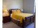 Well-lit bedroom with double bed, nightstands, and ample floor space at 842 Sussex Dr, Davenport, FL 33896