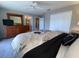 Bedroom with a queen-size bed and private bathroom access at 842 Sussex Dr, Davenport, FL 33896