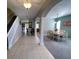 Two-story foyer with tile floors and archway at 842 Sussex Dr, Davenport, FL 33896