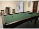 Game room featuring a pool table and bar-height stools at 842 Sussex Dr, Davenport, FL 33896