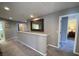 Upstairs hallway with access to bedrooms and bathroom at 842 Sussex Dr, Davenport, FL 33896