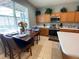 Eat-in kitchen with breakfast table and stainless appliances at 842 Sussex Dr, Davenport, FL 33896