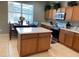 Kitchen with island and breakfast nook at 842 Sussex Dr, Davenport, FL 33896