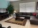 Living room with sectional sofa and window at 842 Sussex Dr, Davenport, FL 33896