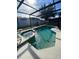 Relaxing pool and spa with screened enclosure and patio at 842 Sussex Dr, Davenport, FL 33896