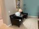 Cozy sitting area with two armchairs at 842 Sussex Dr, Davenport, FL 33896