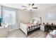 Bedroom with a queen-size bed and built-in desk at 2175 Old Mining Rd, Lakeland, FL 33801