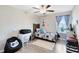 Bright bedroom with a twin bed, desk, and window at 2175 Old Mining Rd, Lakeland, FL 33801