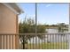 Screened balcony with scenic lake and golf course views at 13548 Turtle Marsh Loop # 438, Orlando, FL 32837