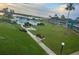 An aerial view of the condo complex showcasing its landscaping and pool at 1600 W Lake Parker Dr # B23, Lakeland, FL 33805