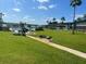 Community pool area with lush landscaping and walkways at 1600 W Lake Parker Dr # B23, Lakeland, FL 33805