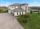 Luxury home with a large yard and paver driveway at 3167 Whisper Wind Dr, St Cloud, FL 34771