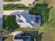 Modern home with private pool and spacious backyard, surrounded by lush landscaping at 3167 Whisper Wind Dr, St Cloud, FL 34771