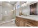 Modern bathroom with double sinks, a walk-in shower, and stylish decor at 3167 Whisper Wind Dr, St Cloud, FL 34771