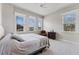 Relaxing bedroom with a king-size bed and plenty of natural light at 3167 Whisper Wind Dr, St Cloud, FL 34771