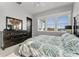 Bright bedroom featuring a comfortable bed and ample natural light at 3167 Whisper Wind Dr, St Cloud, FL 34771