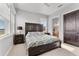 Spacious bedroom with wood furniture and large windows at 3167 Whisper Wind Dr, St Cloud, FL 34771
